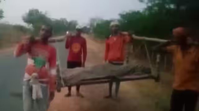 People carried dead body on cot